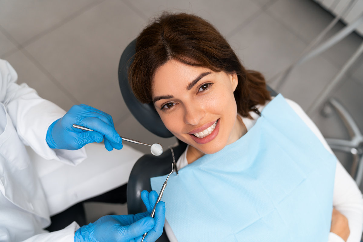 Happy patient looking into the camera with a beautiful smile.