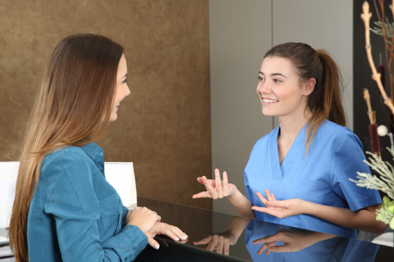 Dentist or nurse attending a patient